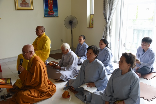 Praying for rebirth and releasing creatures in Ba Lua port, Cu Chi